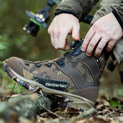 Man adjusting his BOA Fit System dial on his Adak 6 GTX RR BOA hunting boot